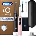 Oral-B iO6 Duopack Zwarte/Roze Elektrische Tandenborstels, 4 Opzetborstels, 1 Reisetui,Etui voor de oplader, Opzetborstel Houlder